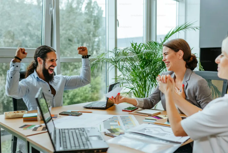 A team celebrating after a successful virtual training session
