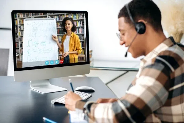 Smiling trainer with engaged participants